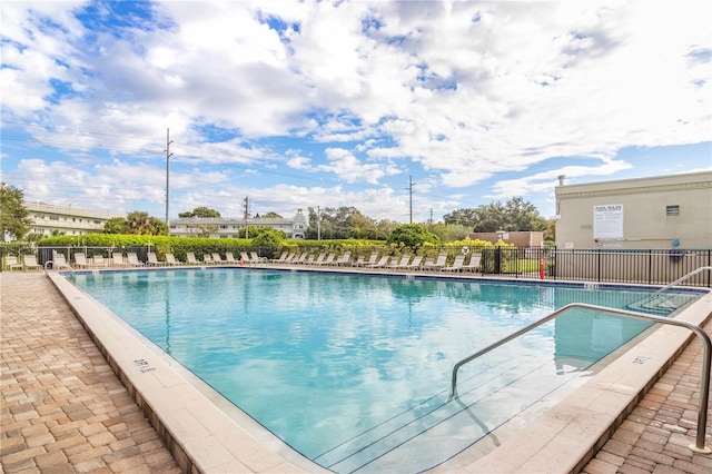 view of swimming pool featuring a patio area