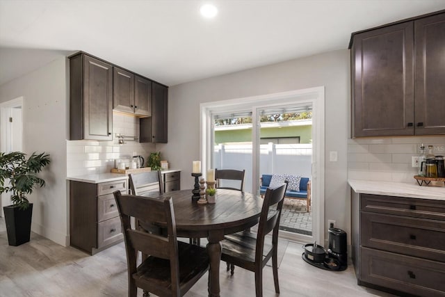 dining space featuring light hardwood / wood-style floors