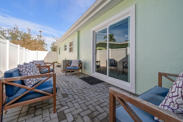 view of patio / terrace with central AC