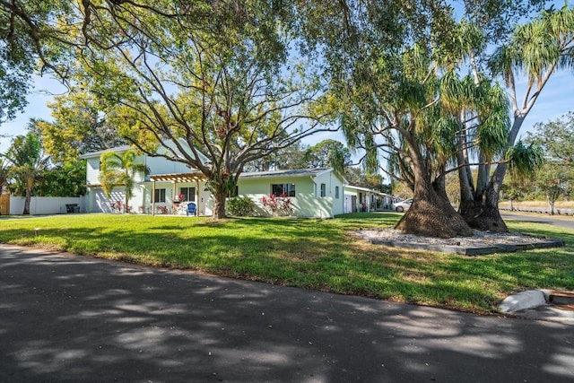 ranch-style house with a front yard