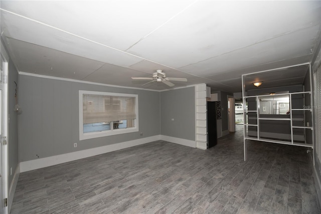 unfurnished living room featuring hardwood / wood-style flooring, ceiling fan, and ornamental molding