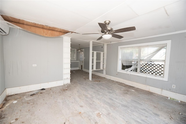 empty room with a wall unit AC, ceiling fan, and hardwood / wood-style flooring