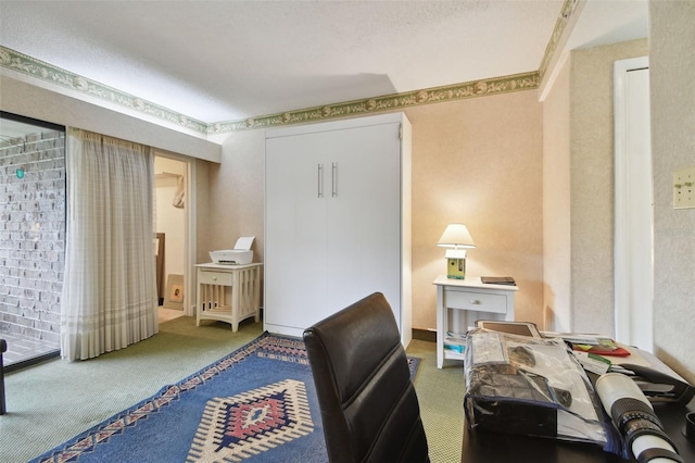 office space featuring carpet and a textured ceiling