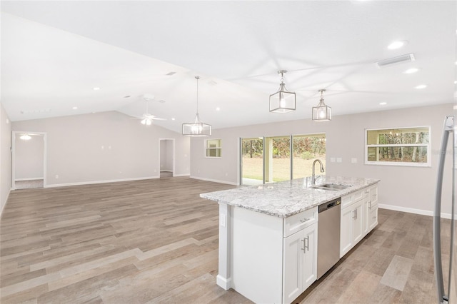 kitchen featuring white cabinetry, dishwasher, ceiling fan, sink, and vaulted ceiling