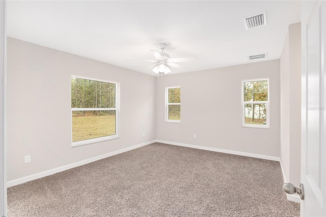 5421 N Nakoma Dr, Beverly Hills, FL 34465 - unfurnished room featuring carpet floors, healthy amount of natural light, and a ceiling fan