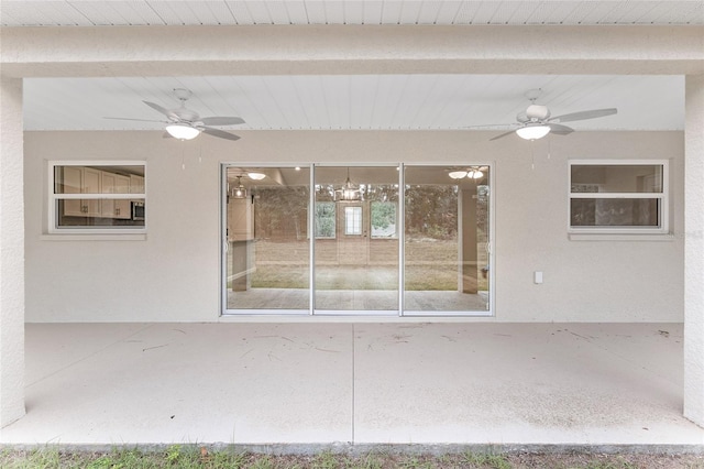 view of patio with ceiling fan