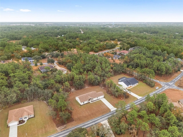 5421 N Nakoma Dr, Beverly Hills, FL 34465 - aerial overview of property's location with a heavily wooded area