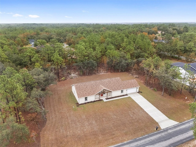 5421 N Nakoma Dr, Beverly Hills, FL 34465 - aerial view of property and surrounding area featuring a heavily wooded area