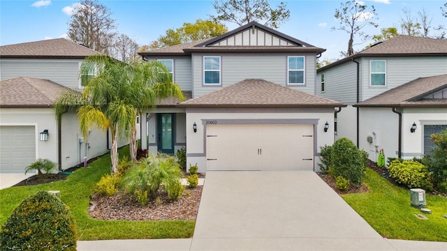 view of front of property with a garage