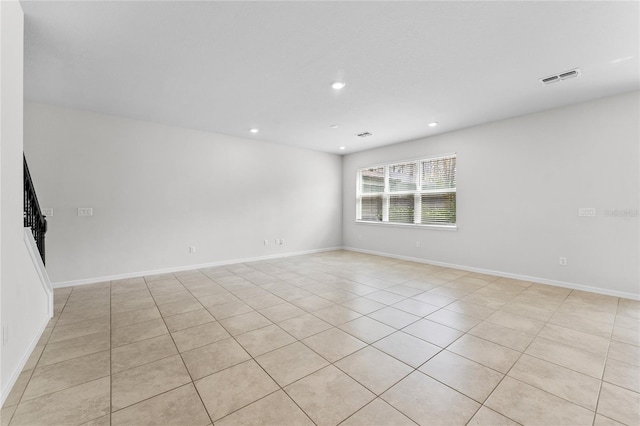 empty room featuring light tile patterned flooring