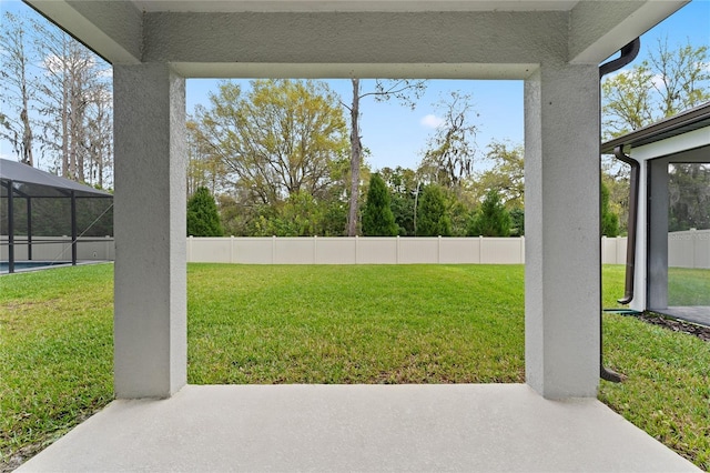 view of yard with a lanai