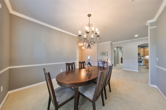 carpeted dining room featuring crown molding and a chandelier