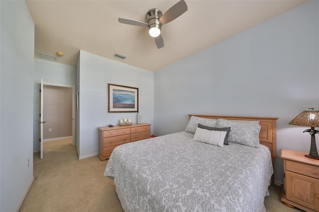 bedroom featuring ceiling fan and light carpet