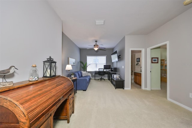 living room with light carpet and ceiling fan