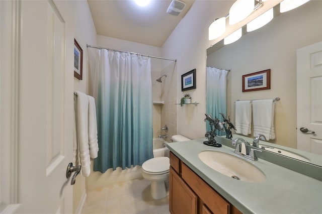 full bathroom with tile patterned floors, vanity, shower / tub combo, and toilet