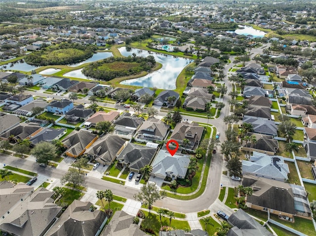 drone / aerial view featuring a water view