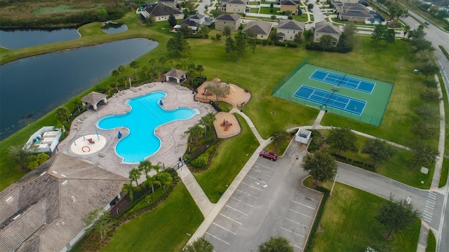 birds eye view of property featuring a water view