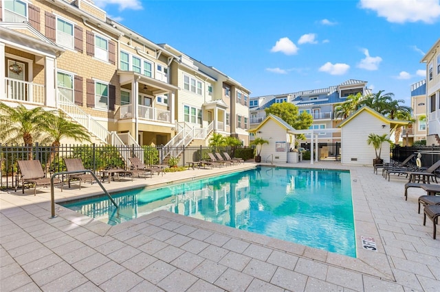 view of swimming pool with a patio