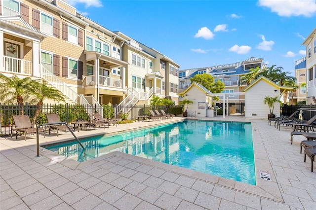 19915 Gulf Blvd Unit 805, Indian Shores, FL 33785 - community pool with stairs, a residential view, and a patio