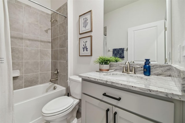 full bathroom featuring vanity, toilet, and shower / tub combo with curtain