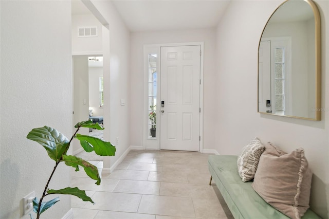 entrance foyer with light tile patterned flooring