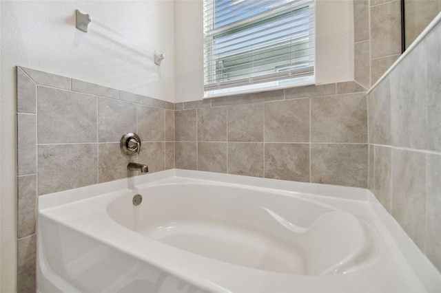 bathroom featuring a tub