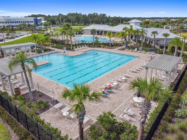 view of swimming pool featuring a pergola and a patio area