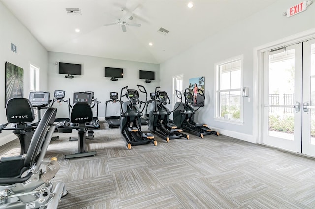 workout area with ceiling fan, french doors, light colored carpet, and vaulted ceiling