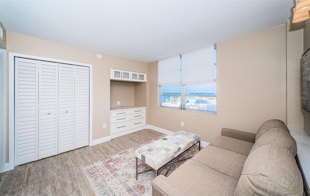 sitting room with light hardwood / wood-style flooring