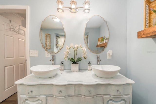 bathroom featuring vanity and wood-type flooring