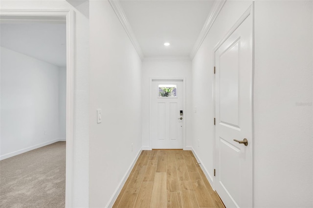 corridor with crown molding and light wood-type flooring