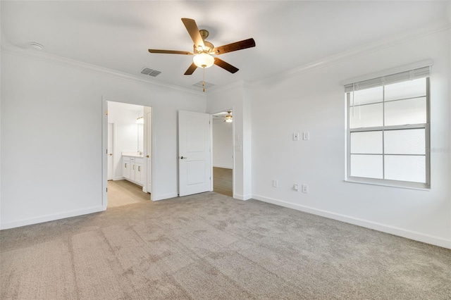 unfurnished bedroom with connected bathroom, ceiling fan, light carpet, and ornamental molding