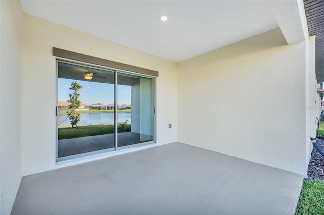 view of patio / terrace featuring a water view