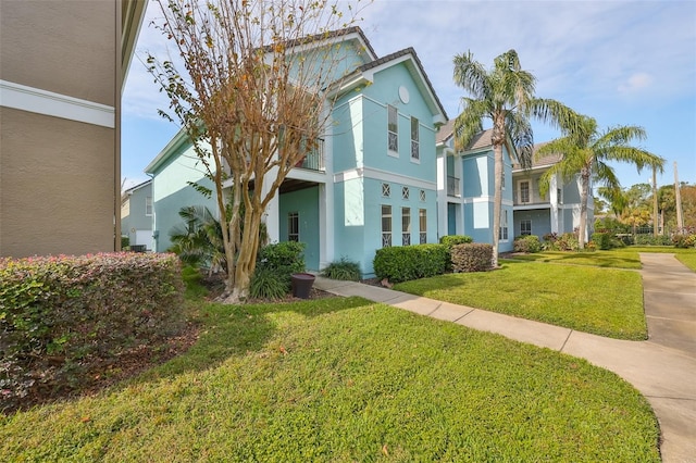 view of front facade with a front lawn