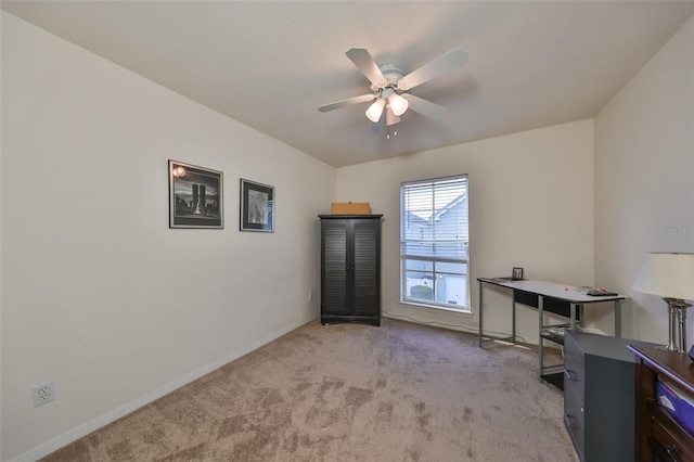 interior space featuring light carpet and ceiling fan