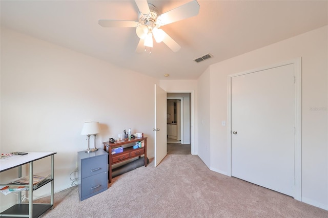 carpeted bedroom featuring ceiling fan