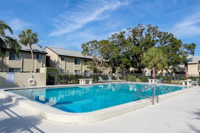 view of pool featuring a patio