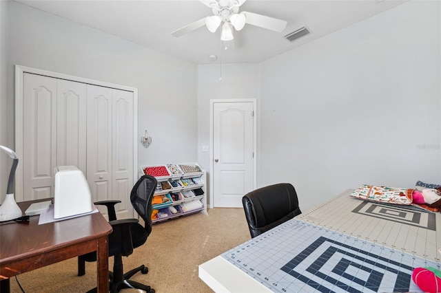 office featuring carpet flooring and ceiling fan