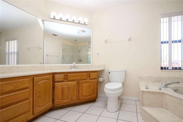 full bathroom featuring tile patterned floors, vanity, toilet, and shower with separate bathtub