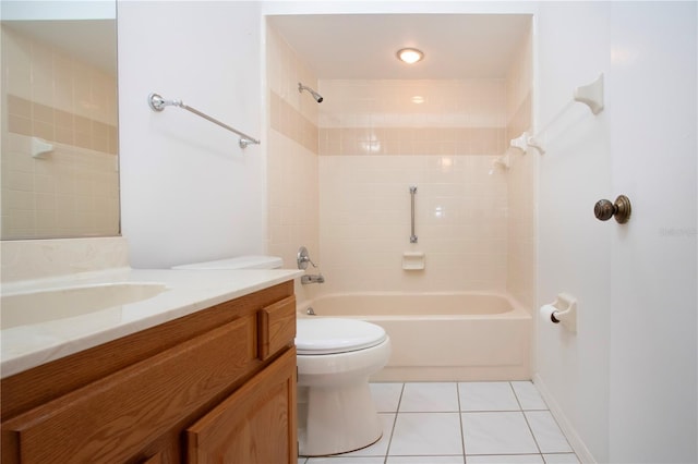 full bathroom featuring tile patterned flooring, vanity, toilet, and tiled shower / bath