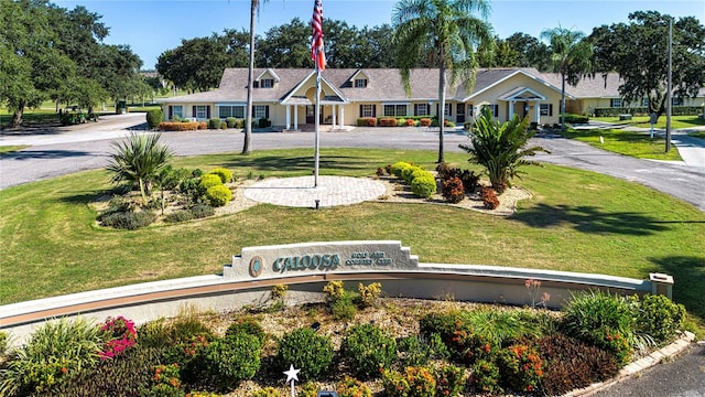 view of community featuring a lawn