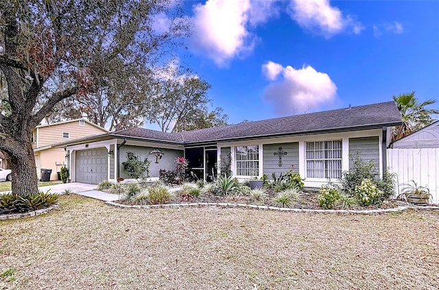 ranch-style home with a garage