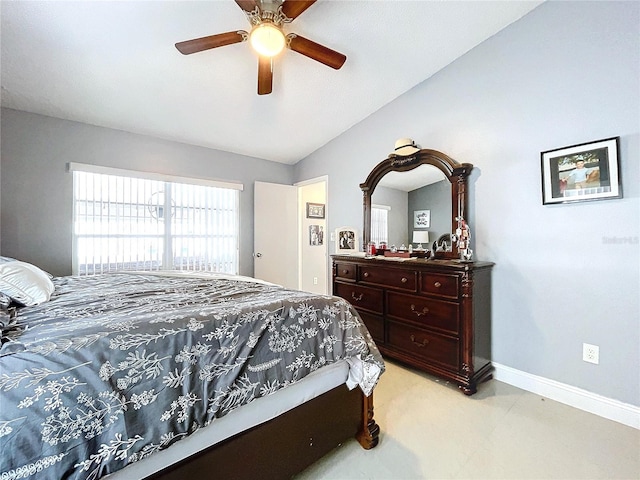 bedroom featuring ceiling fan and vaulted ceiling