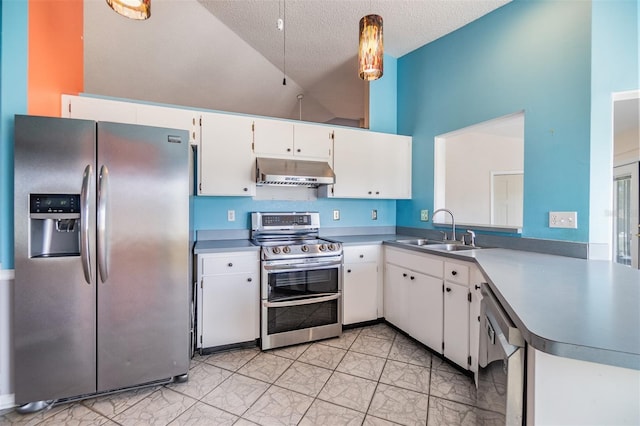 kitchen with white cabinets, sink, hanging light fixtures, a textured ceiling, and stainless steel appliances