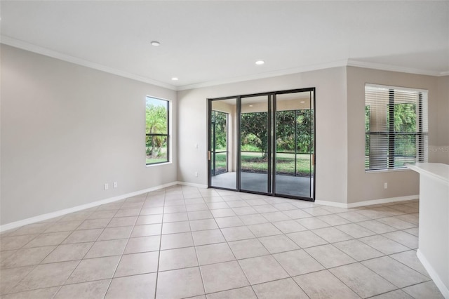 tiled spare room with ornamental molding