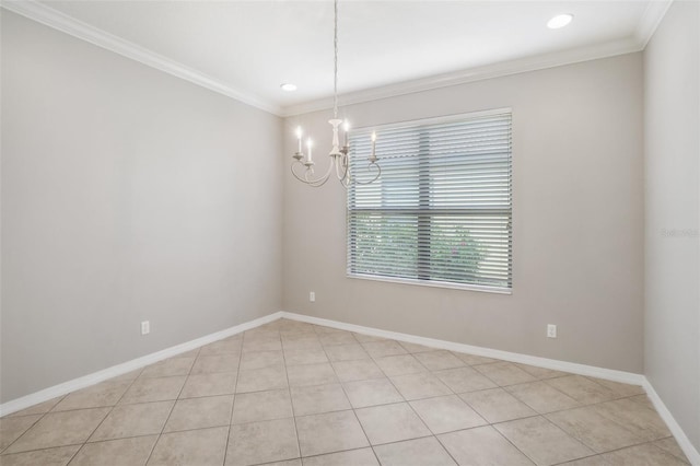 tiled empty room featuring crown molding and a chandelier