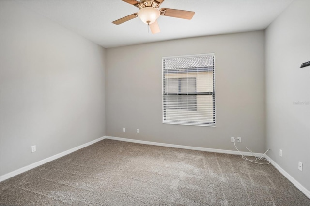 carpeted empty room with ceiling fan