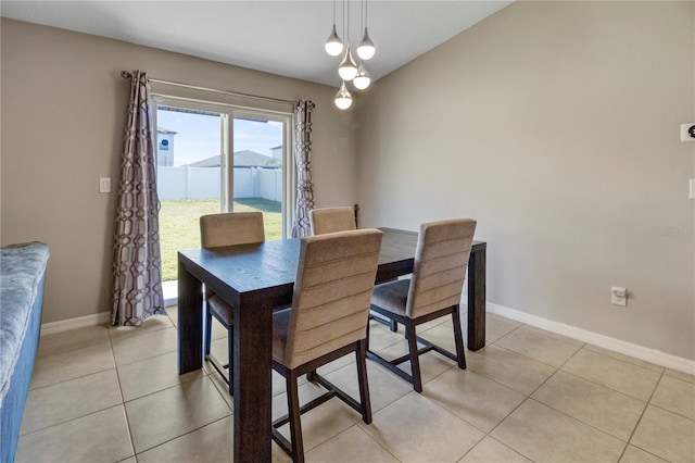 dining space with light tile patterned floors