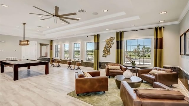 interior space with ceiling fan, crown molding, and billiards