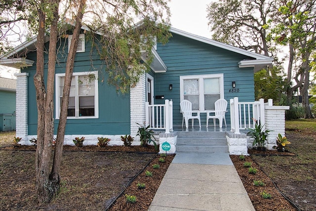 bungalow featuring a porch